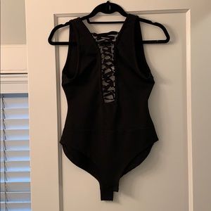 Revolve Lace Up Body Suit